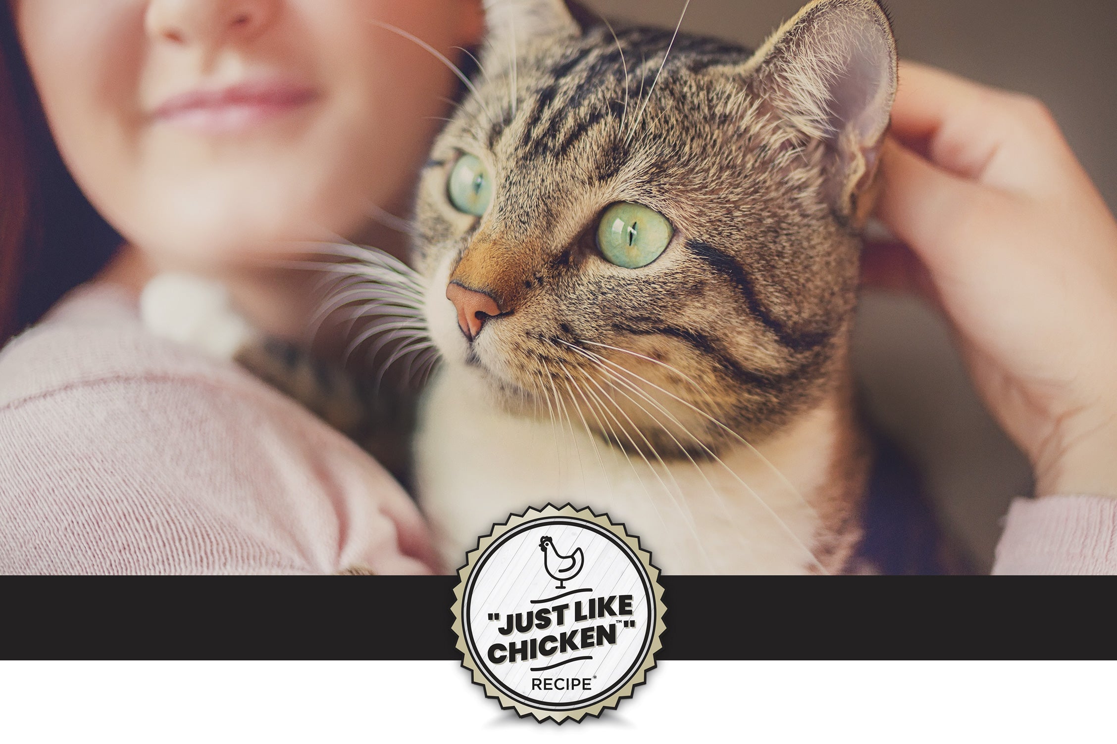 A close-up of a girl with light skin smiling as she pets a gray striped cat. The image advertises sustainable protein from dry yeast, featuring the text "Sustainable Complete Protein*" above. Below, it states, "Our primary source of protein is a dry yeast that contains all the nutrients and amino acids found in animal proteins like chicken!" Additionally, there's a badge that reads "Just Like Chicken" with a recipe icon.