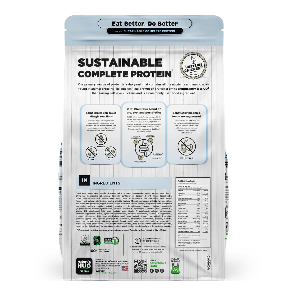 Back view of a Nature's Hug Puppy, Nutrients for Growth Formula Dog Food for Medium & Large Breeds bag. The package features the 'Sustainable Complete Protein' label with a green header and the slogan 'Eat Better. Do Better.' Icons highlight the plant-based, non-GMO protein source. Additional details include allergen information, nutrients, and the claim of being similar to chicken. The back lists ingredients and nutritional facts.