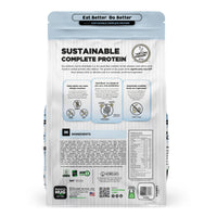 Back view of a Nature's Hug Puppy, Nutrients for Growth Formula Dog Food for Toy & Small Breeds  Food bag. The package features the 'Sustainable Complete Protein' label with a green header and the slogan 'Eat Better. Do Better.' Icons highlight the plant-based, non-GMO protein source. Additional details include allergen information, nutrients, and the claim of being similar to chicken. The back lists ingredients and nutritional facts.