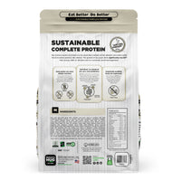 Back view of a Nature's Hug Adult, Supports Vitality Formula Dog Food for Toy & Small Breeds  bag. The package features the 'Sustainable Complete Protein' label with a green header and the slogan 'Eat Better. Do Better.' Icons highlight the plant-based, non-GMO protein source. Additional details include allergen information, nutrients, and the claim of being similar to chicken. The back lists ingredients and nutritional facts.